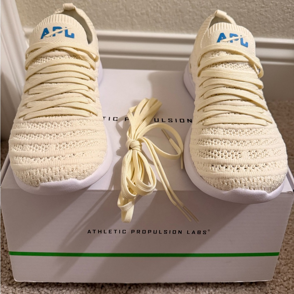 APL Women's Athletic Shoes in Cream with Blue Accents